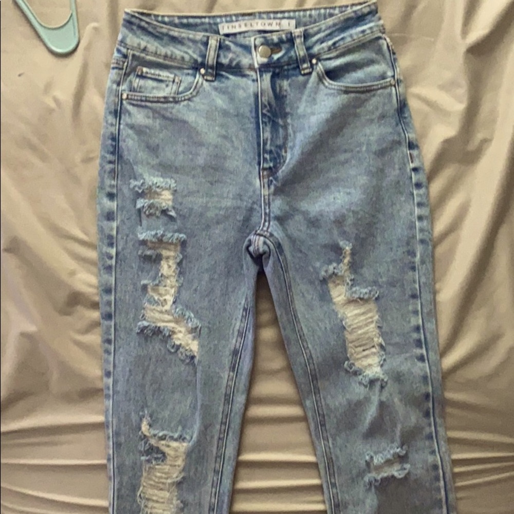 Slightly ripped jeans